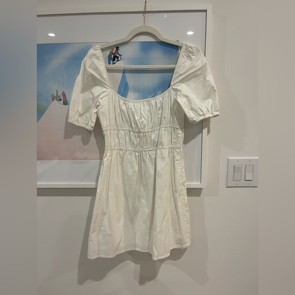 White Reformation dress with puff sleeves